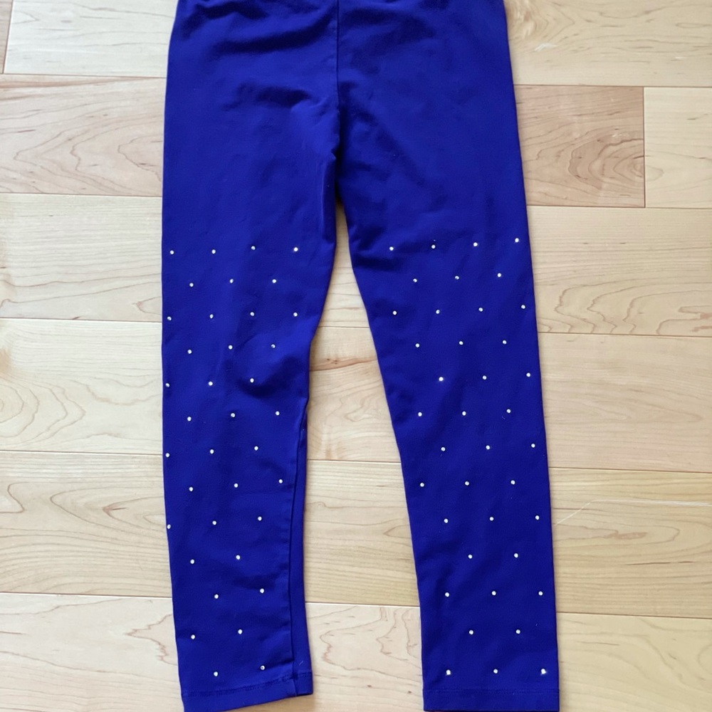 Girls purple rhinestone leggings.